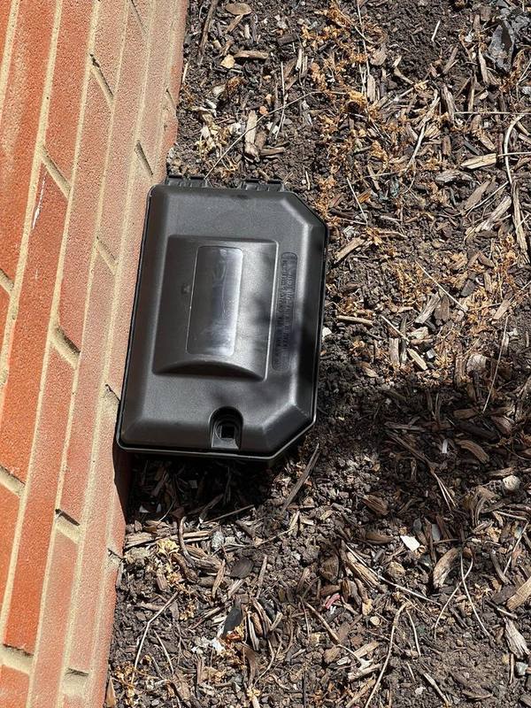 Secured rodent bait station